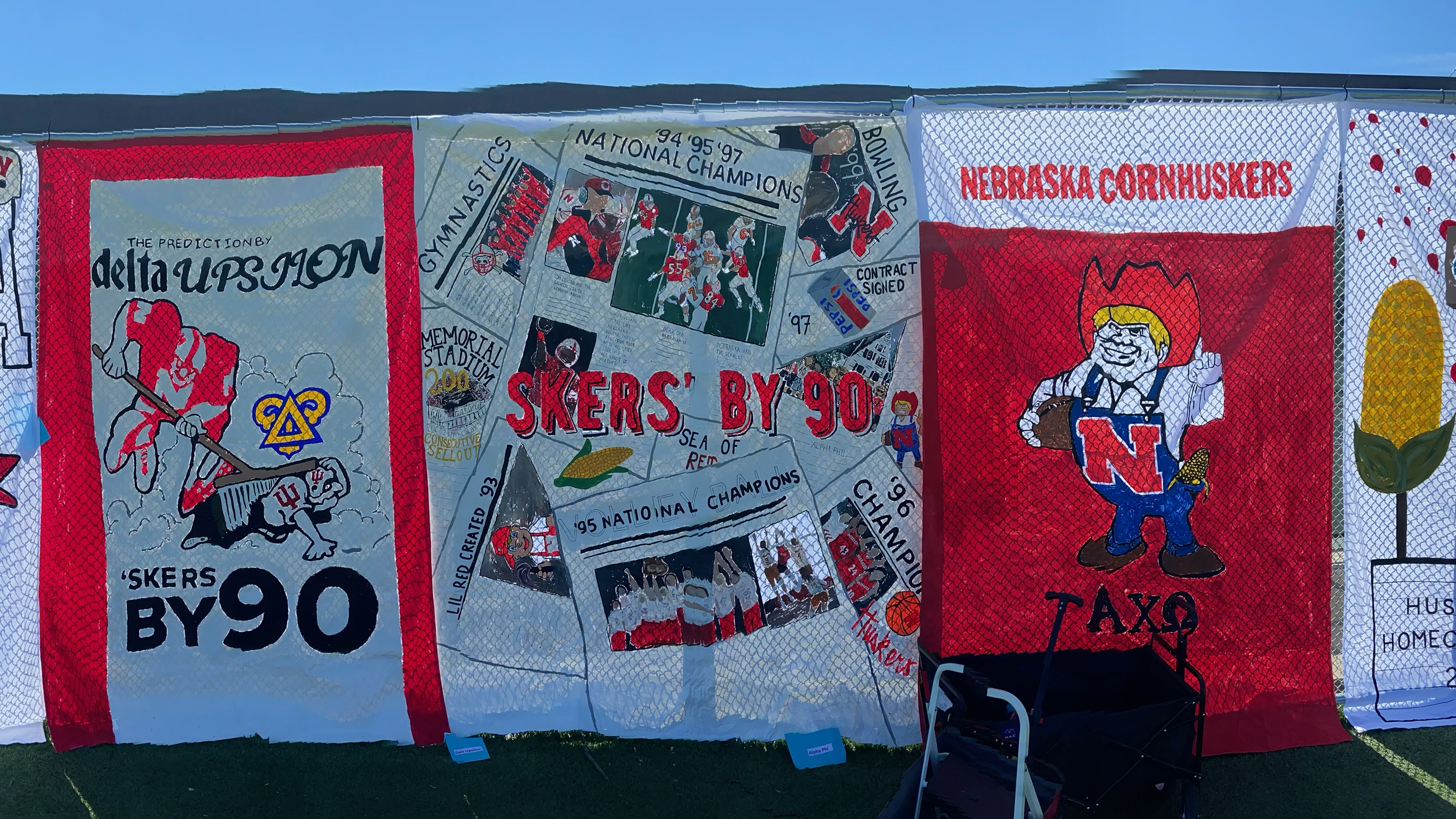 Homecoming banners designed by student groups are on display at Vine Street Fields in 2022.