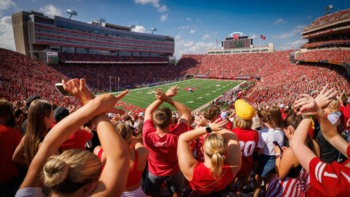 Crowd cheering at Husker football game