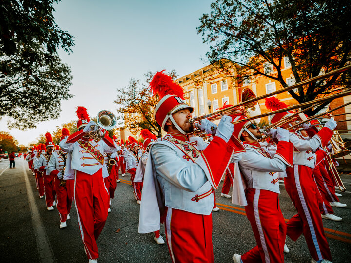 Cornhusker Marching Band performs at the Homecoming Parade.