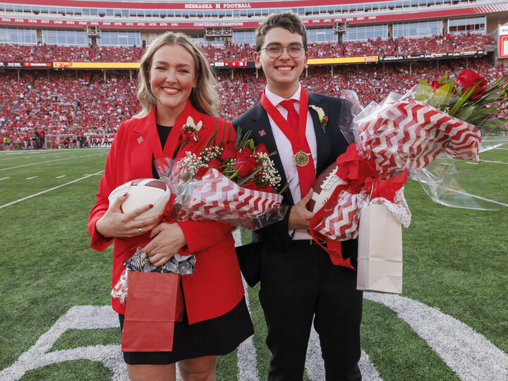 Seniors Emmerson Putnam (left) and Jamie Smith were crowned homecoming royalty during halftime of the Nebraska-Rutgers football game Oct. 5. [Craig Chandler | University Communication and Marketing]