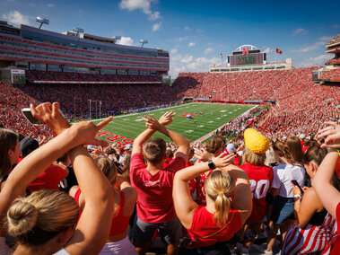 Crowd cheering at Husker football game